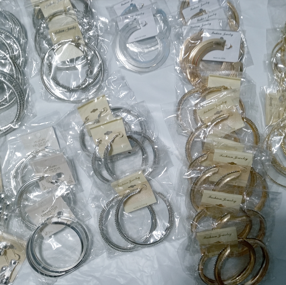 All 35 pairs for one low price!! Gold and Silver Tone Hoop Earrings